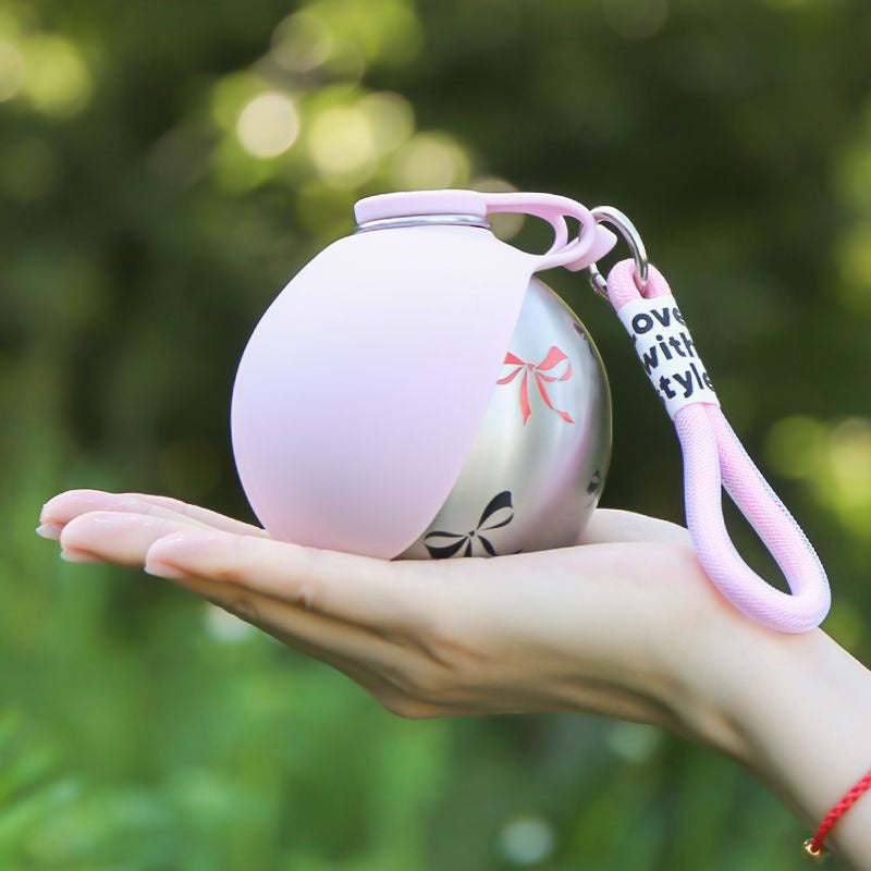 Portable Dog Water Bottle with Bowl 
? Leak Proof Travel Water Dispenser 
for Dogs, One-Hand Operation, 
Lightweight BPA-Free Pet Water 
Bottle for Walking, Hiking & Travel 
(Pink, 285ml)